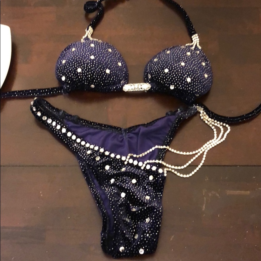 Brand new, never worn competition suit.